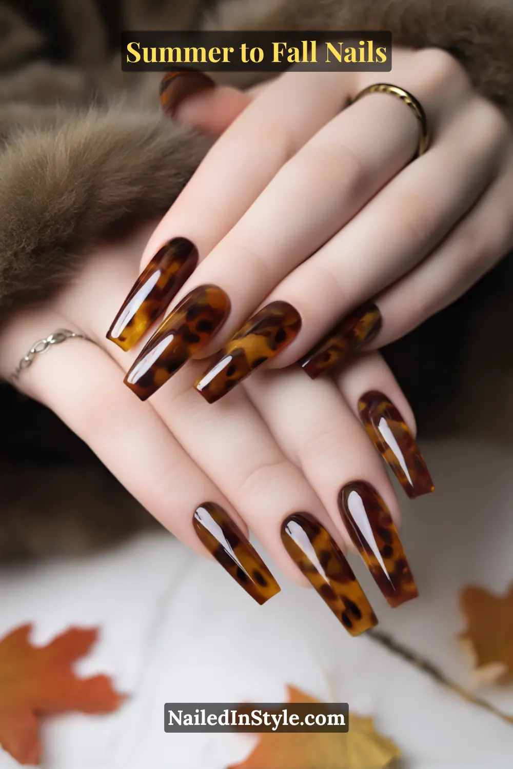 fall oval nails with chestnut tortoiseshell spots and high gloss