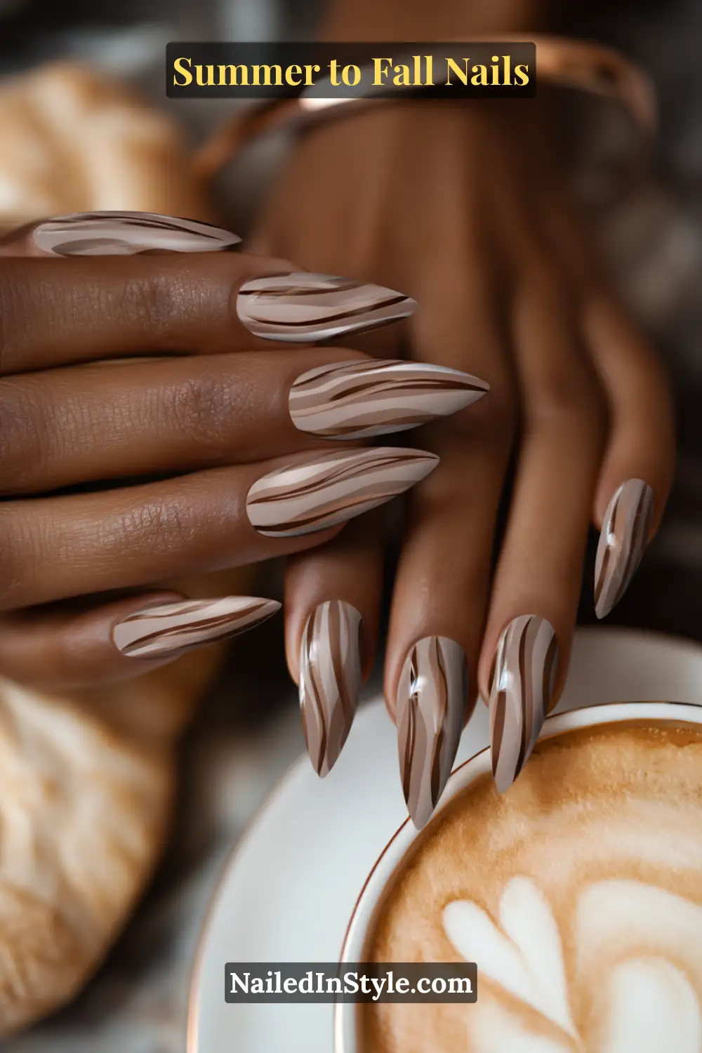 fall oval nails with cocoa and latte micro swirls on a milky base