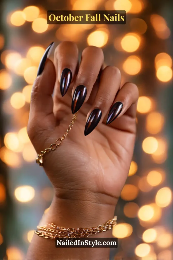 October fall nails with almond-shaped amber cat-eye design, magnetic shimmer line that shifts under twinkle lights for instant glam.