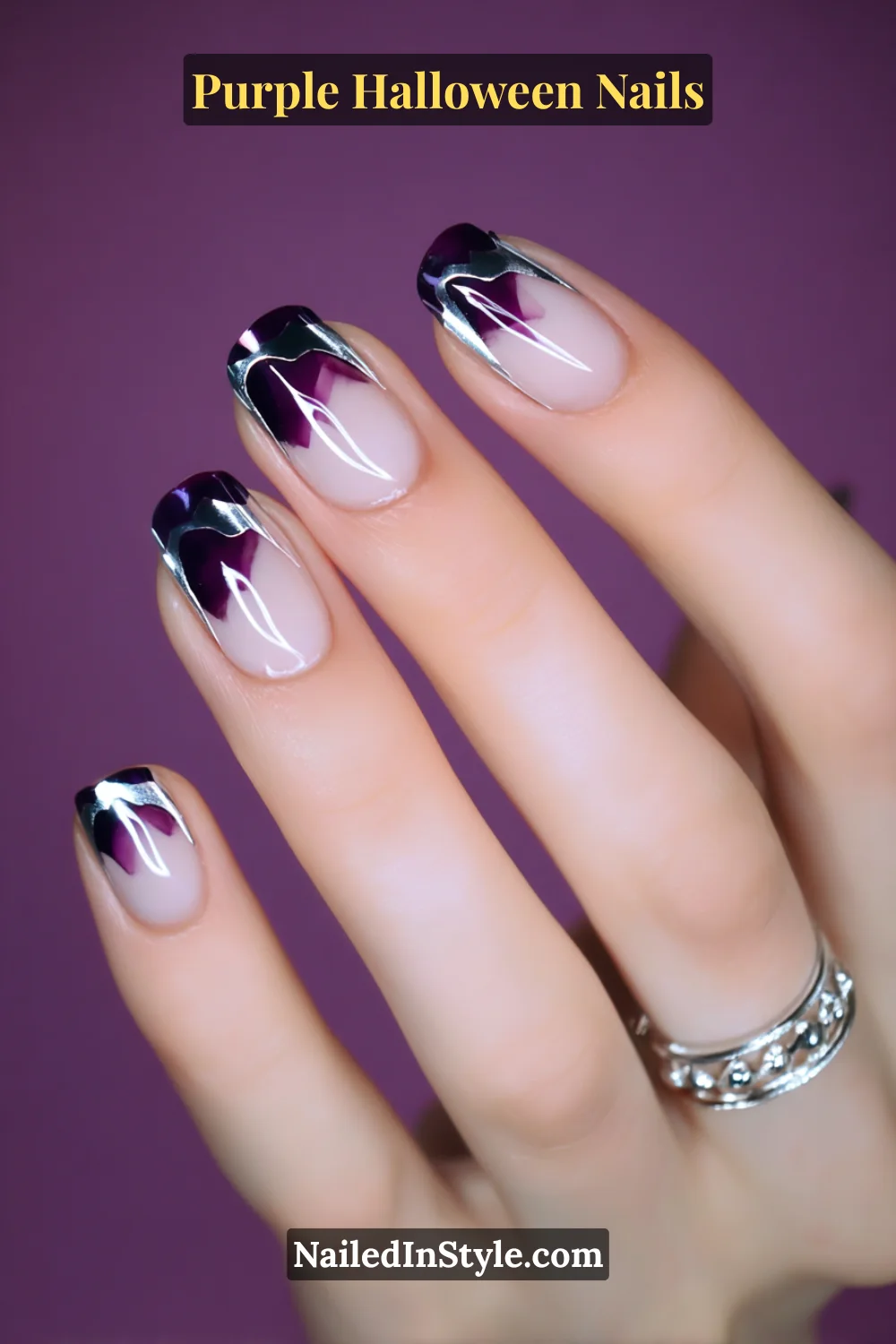 Purple Halloween Nails Medium almond nails with a jelly-sheer lilac base veiled in smoky chrome ribbons, creating a 3D amethyst glow that shimmers like moonlit glass — both haunting and couture.
