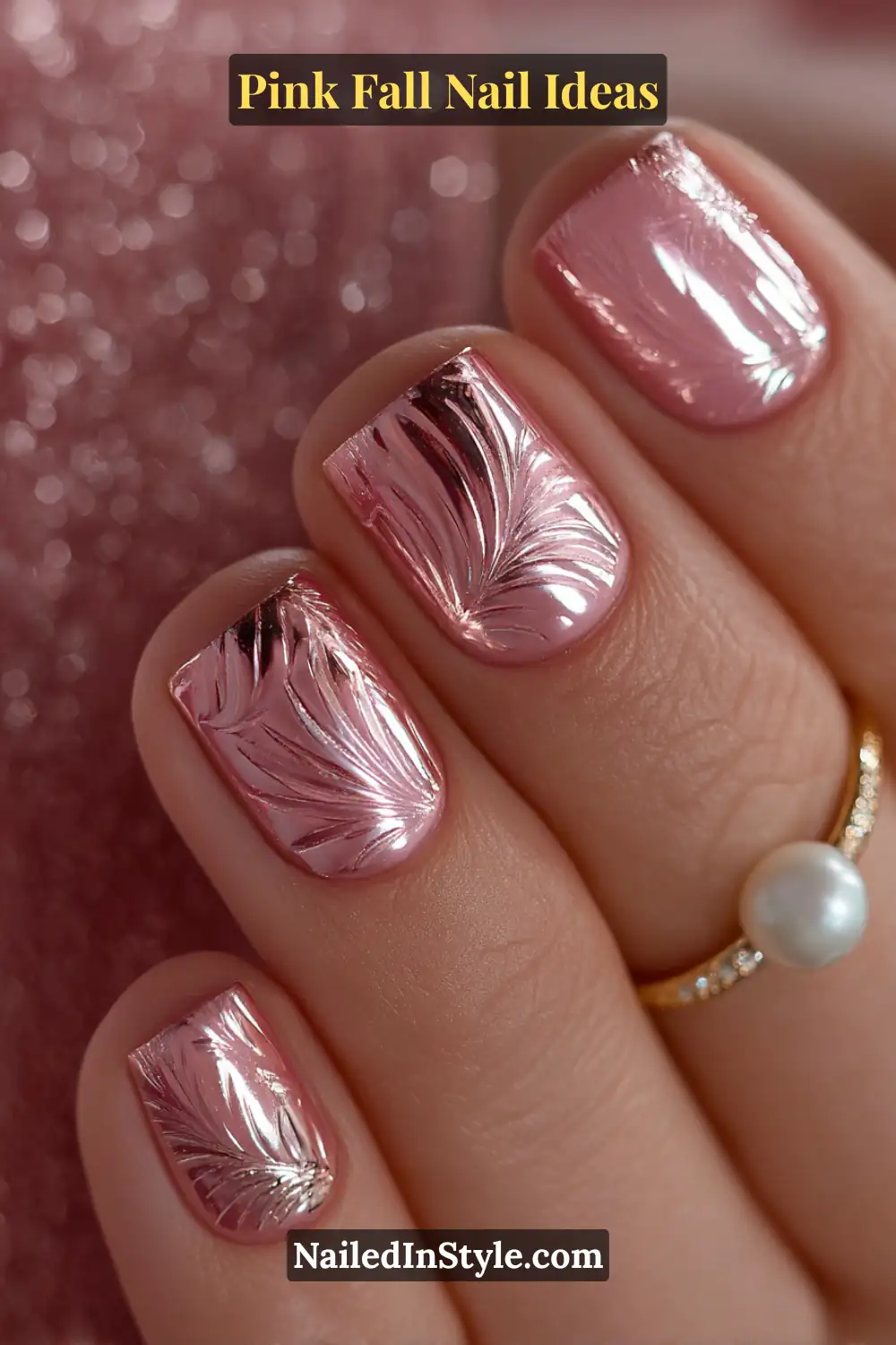 Pink Fall Nail Ideas: Chic, Fast & Photogenic 2025 10 Short square nails in antique rose chrome with raised metallic arcs forming a 3D pattern, glowing softly beside a pearl ring for a luxe autumn look.