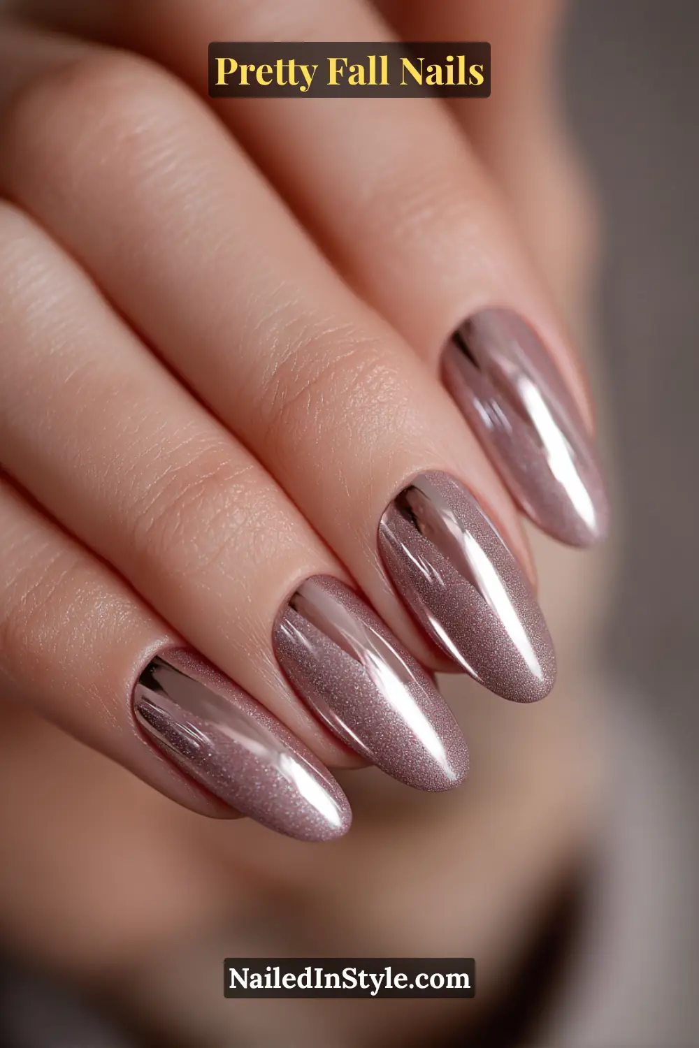 Pretty Fall Nails Medium oval nails glazed in a chai-taupe shimmer with a silver magnetic beam gliding through the center, catching light like a cat’s eye and giving a smooth mirrored depth perfect for fall evenings.
