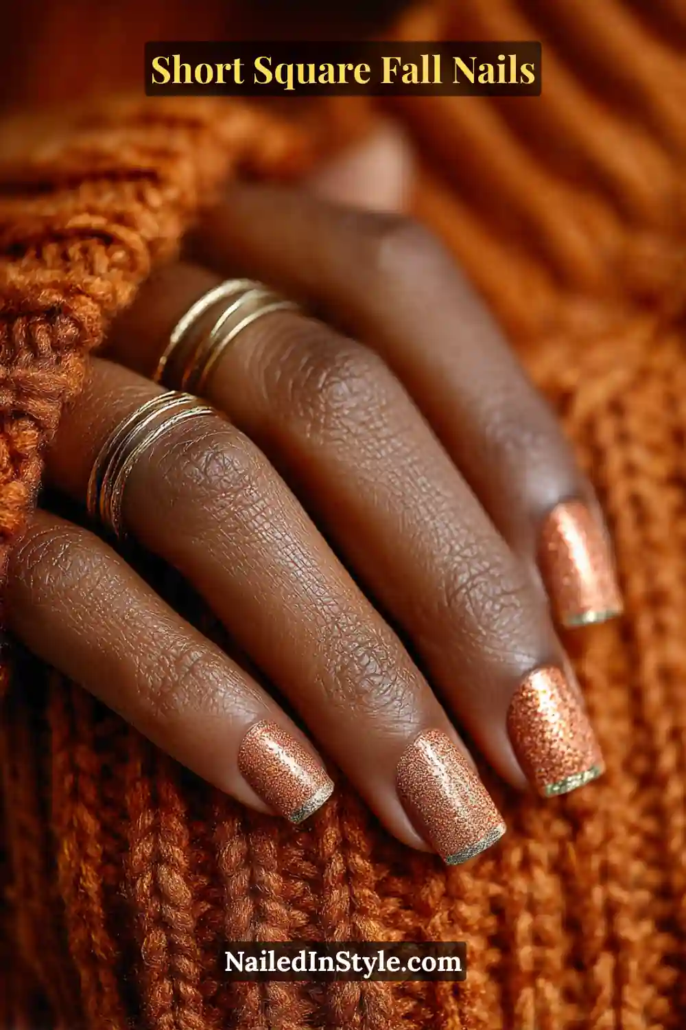 Short square nails in matte amber with metallic silver right-angle corners, adding a sleek 3D chrome accent that pops against cozy fall knits.