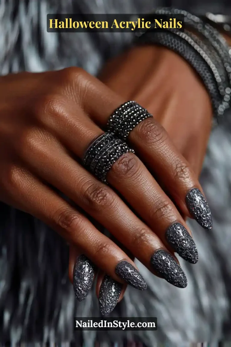 Close-up of almond-shaped Halloween acrylic nails with ultra-thin neon barcode-style color lines framing charcoal shimmer nails, paired with textured dark rings and metallic background.