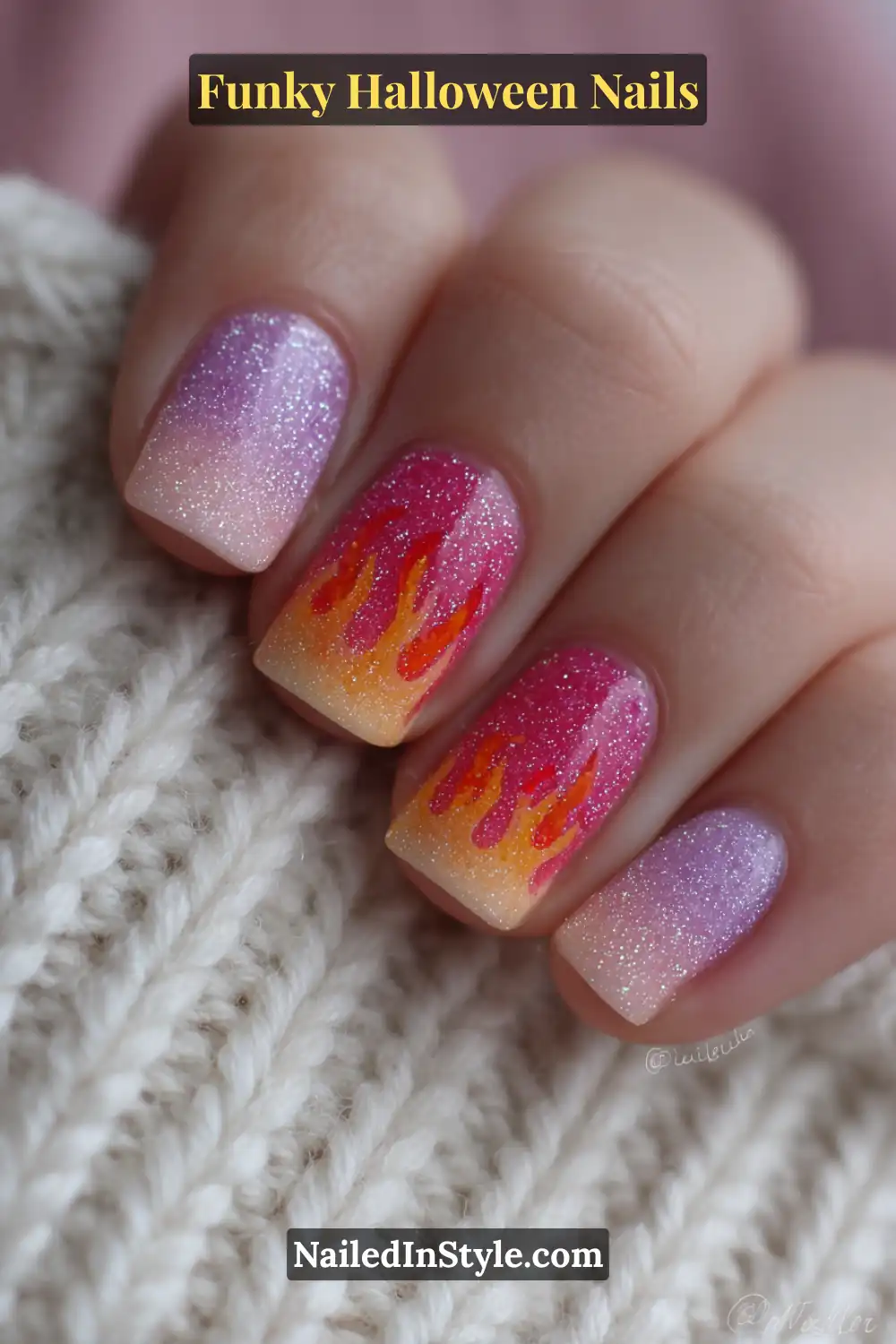 Short square nails in magenta, orange, and lilac hues featuring holographic glitter flames outlined in neon tones, creating a joyful, sparkling Halloween vibe with playful contrast.