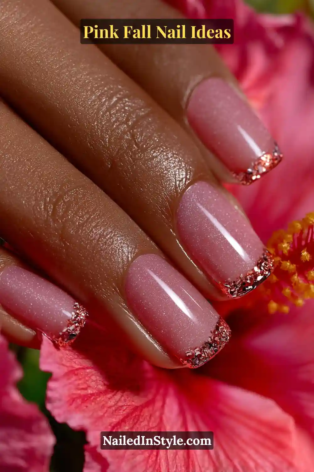 Pink Fall Nail Ideas: Chic, Fast & Photogenic 2025 8 Medium squoval nails in glossy hibiscus pink with glittering copper cuffs near the cuticle, adding warm 3D shimmer that complements deeper skin tones.