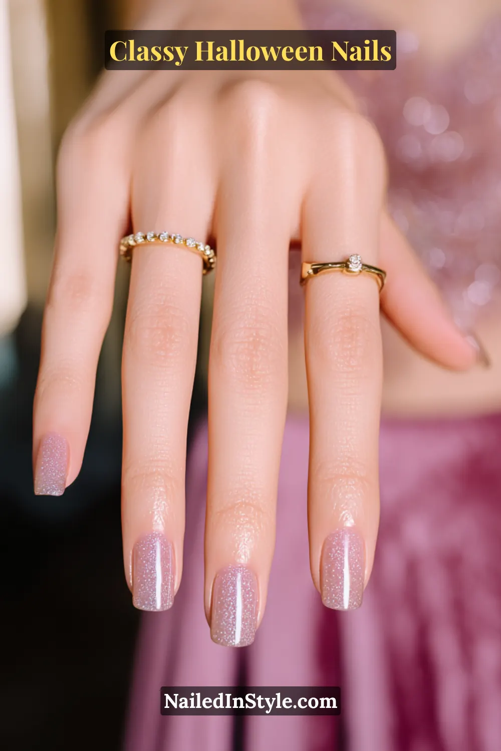 Short round nails glazed in a sheer opal tone with soft gold micro-shimmer that catches candlelight — a luminous, understated glow perfect for elegant Halloween soirées.
