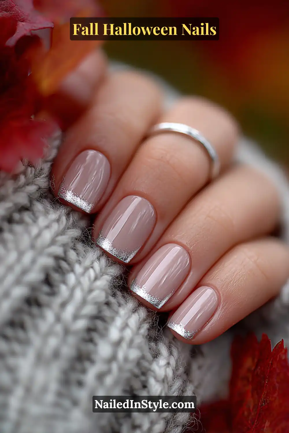 Fall Halloween Nails Short square nails with a sheer ivory-pewter base and refined silver micro-French tips, styled with a cozy knit sweater and a minimalist silver ring for a soft autumn gleam.
