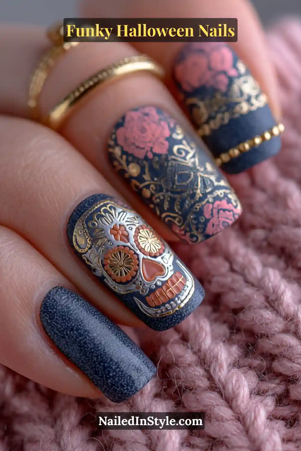 Long coffin nails adorned with coral, cobalt, gold, and ivory mosaic detailing, featuring embossed sugar skull motifs and fine gold bead accents in 3D texture for an opulent Halloween statement.