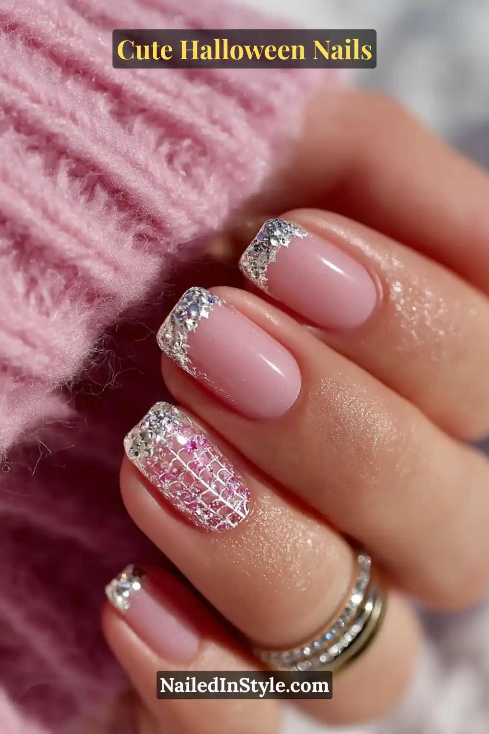 Cute Halloween nails in rose nude with silver heart-web cuffs and sparkling 3D accents on long ballerina nails, styled with stainless ring stack.