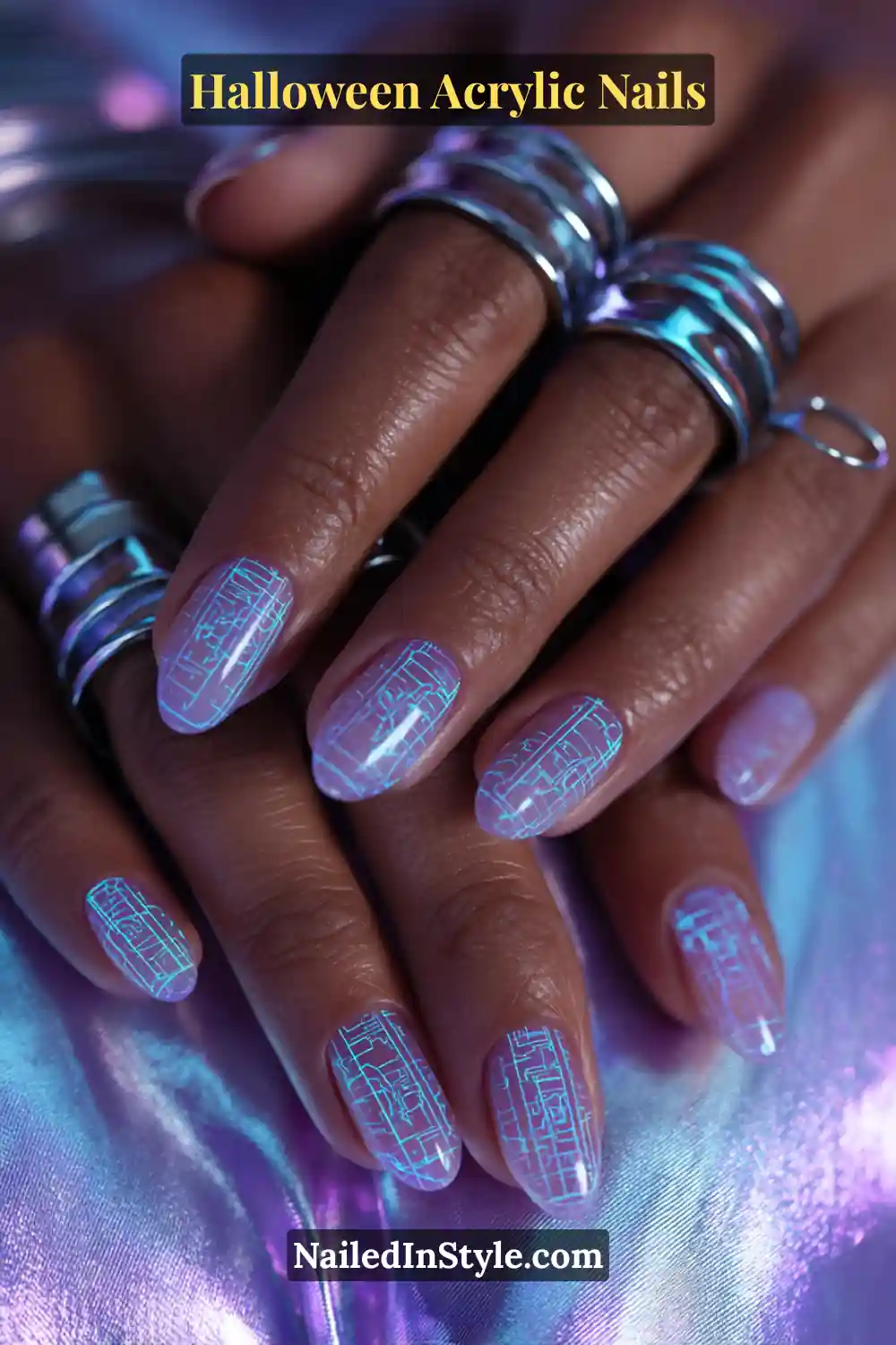 Close-up of almond-shaped acrylic nails glowing under black light, revealing electric blue rune grid patterns across clear jelly layers, styled with metallic silver rings on deep skin tone against holographic background.