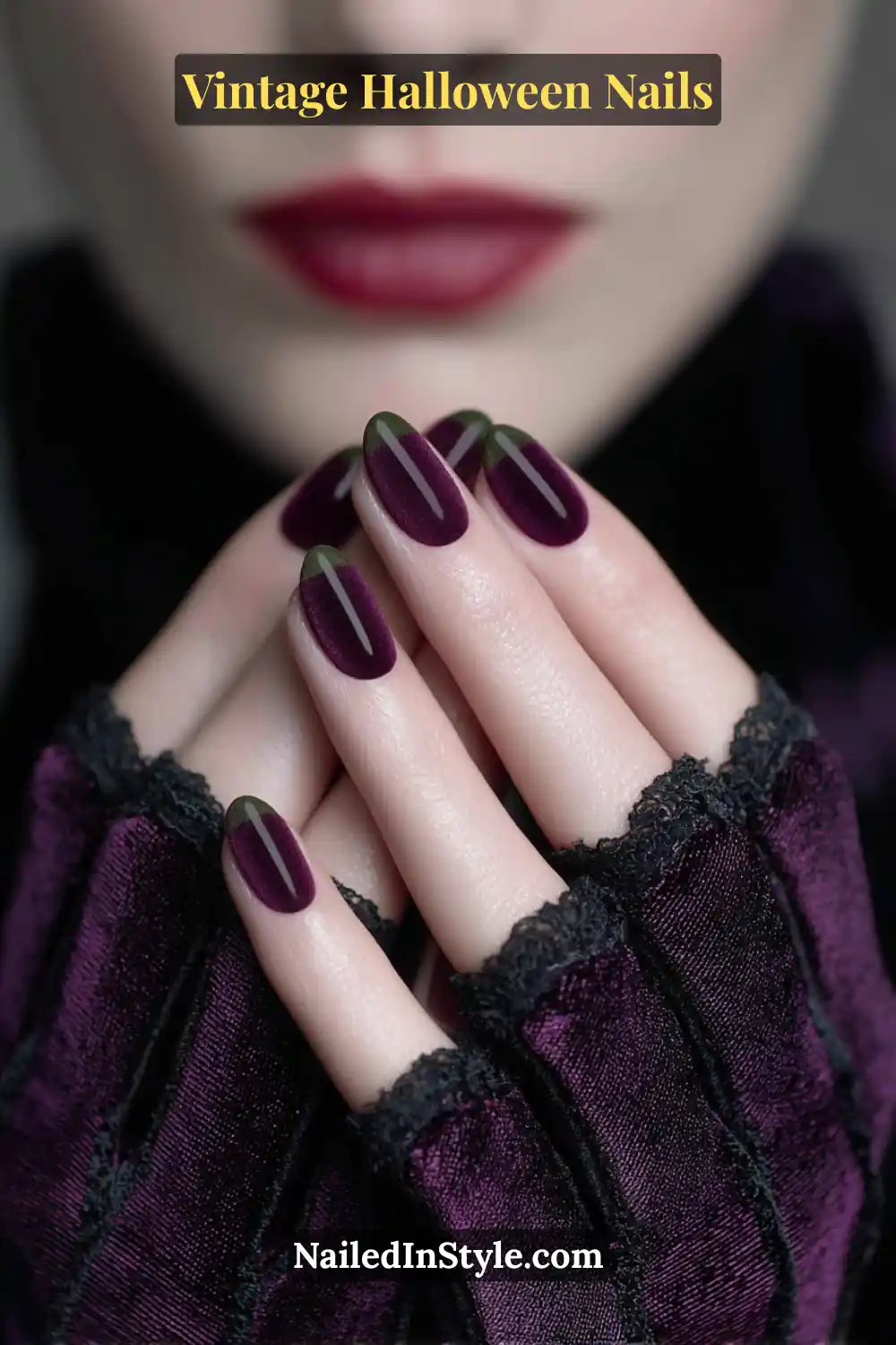 Long almond nails in deep blackberry and aubergine with a velvet matte finish and satin half-moon edges, styled like elegant opera gloves for a vintage Halloween look.