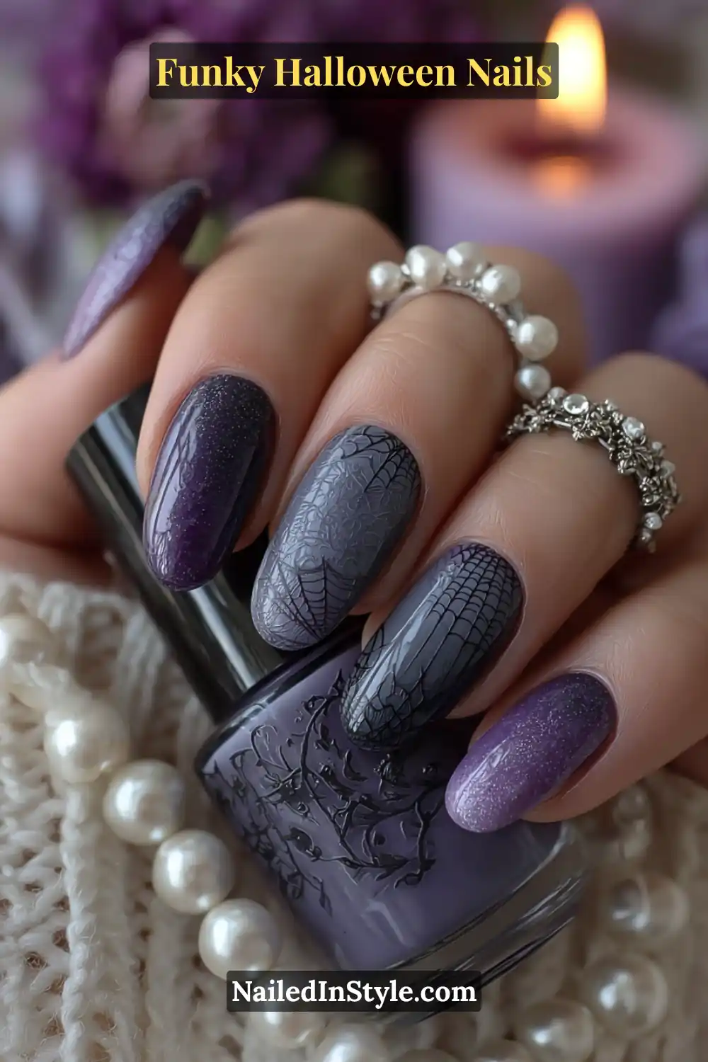 Medium oval nails in violet smoke, graphite, and lilac shades featuring a soft ombré gradient detailed with delicate micro-silver spider webs, paired with pearl accessories for a luxe Halloween look.