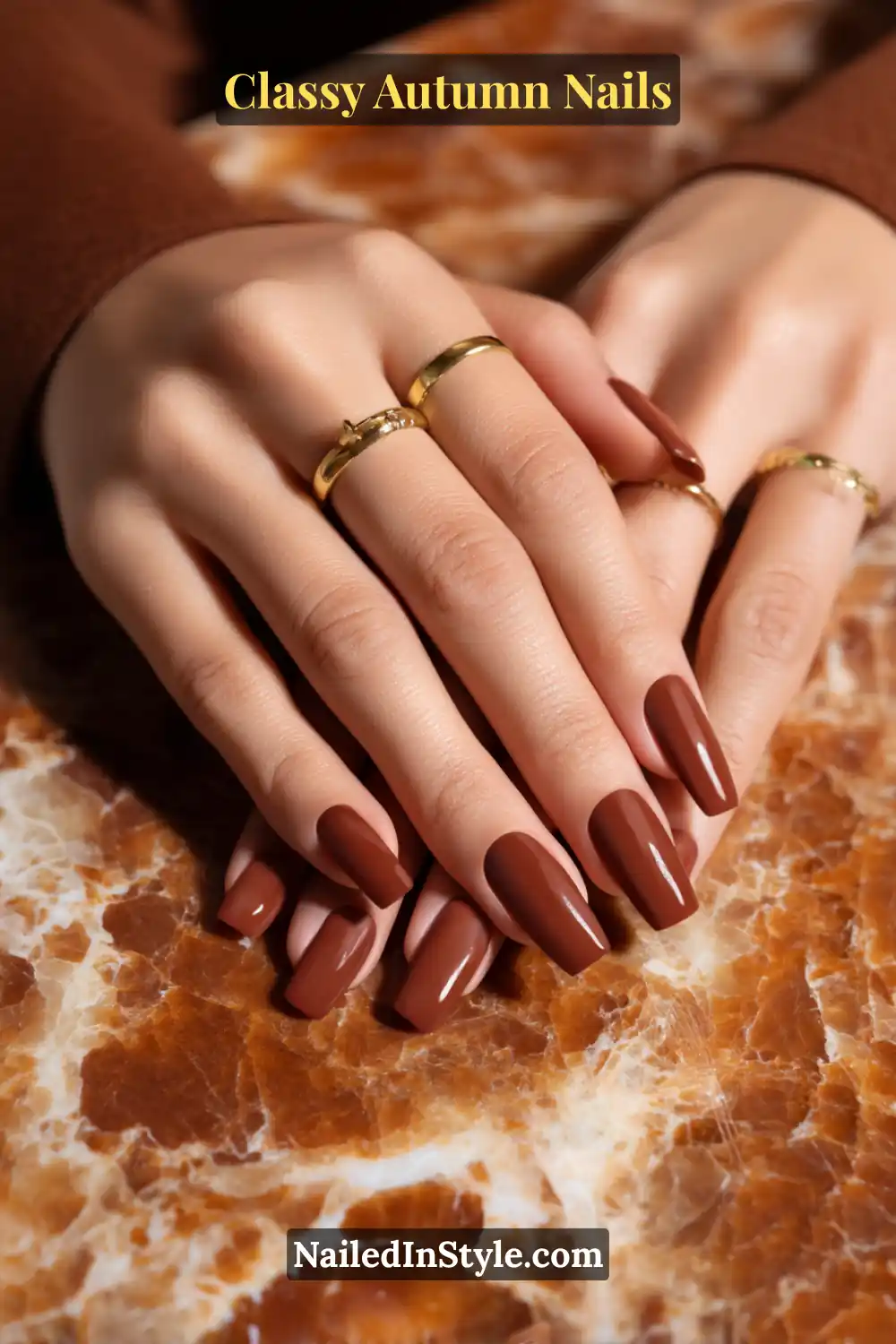 Coffin autumn nails with smokey cognac clouds diffused over espresso base and finished in a refined matte look.