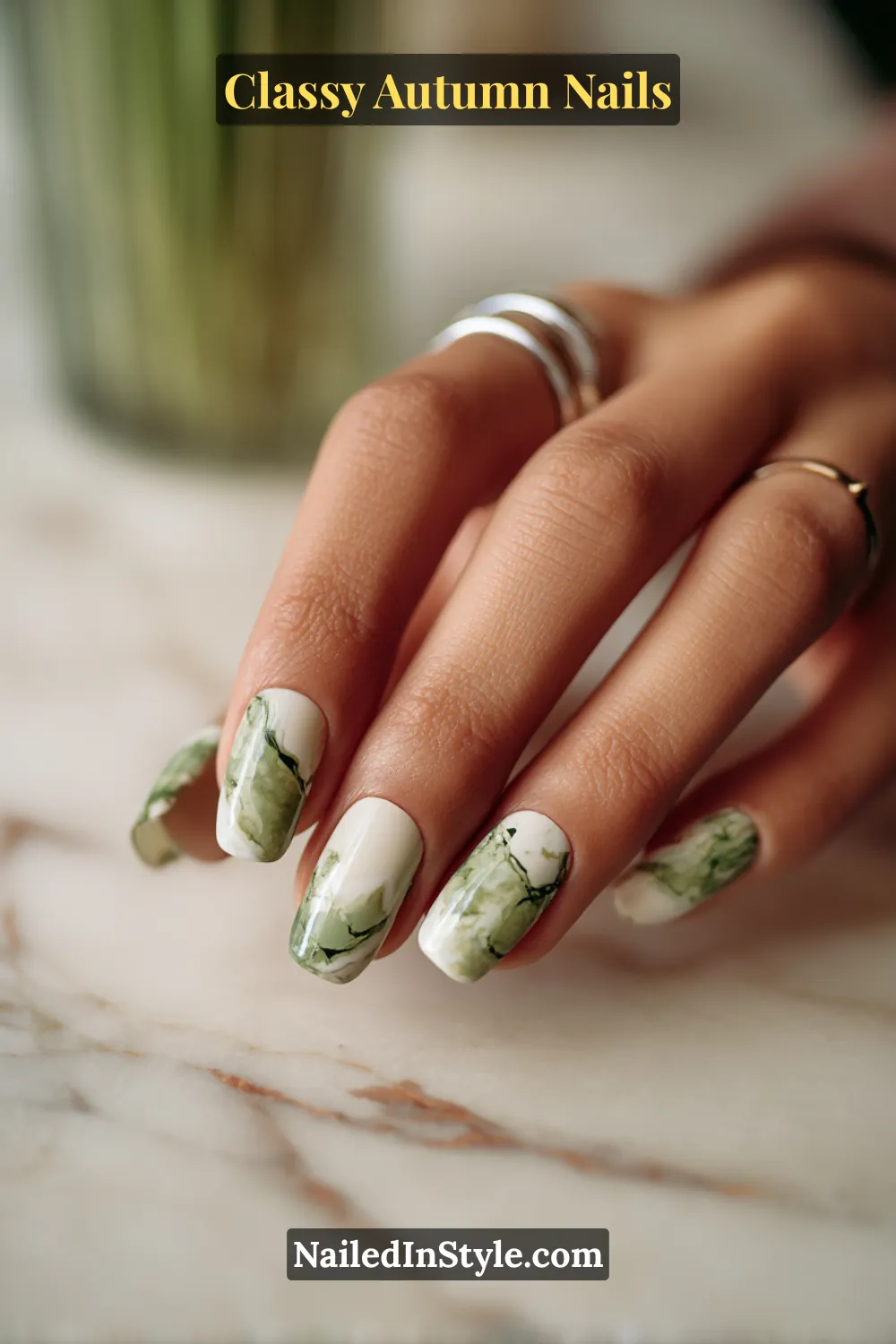 Square autumn nails with creamy stone base and mossy green veining, inspired by agate stone texture.