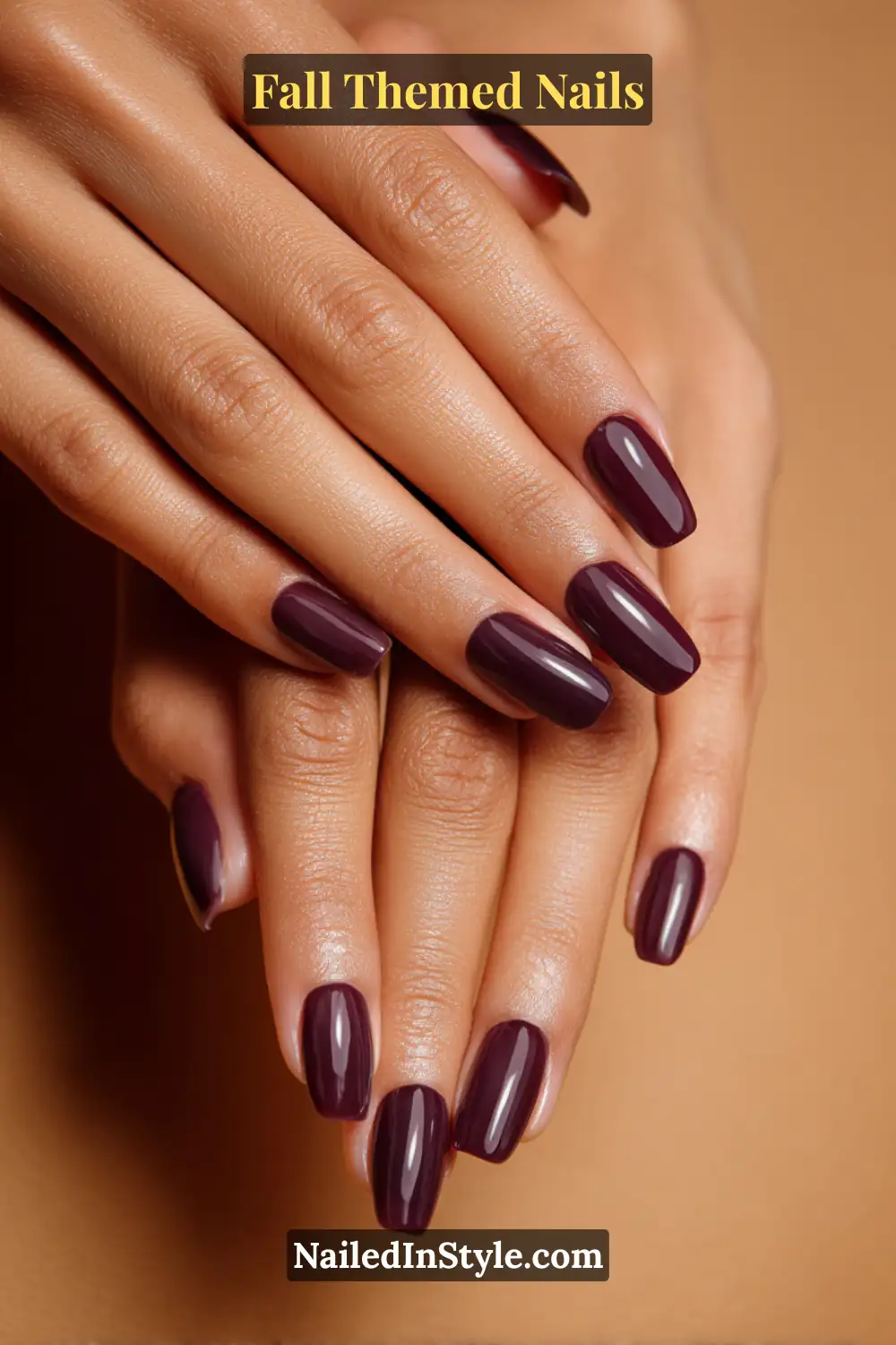 Coffin fall nails with deep blackberry tips over sheer mauve base, glossy finish for olive and deep skin.