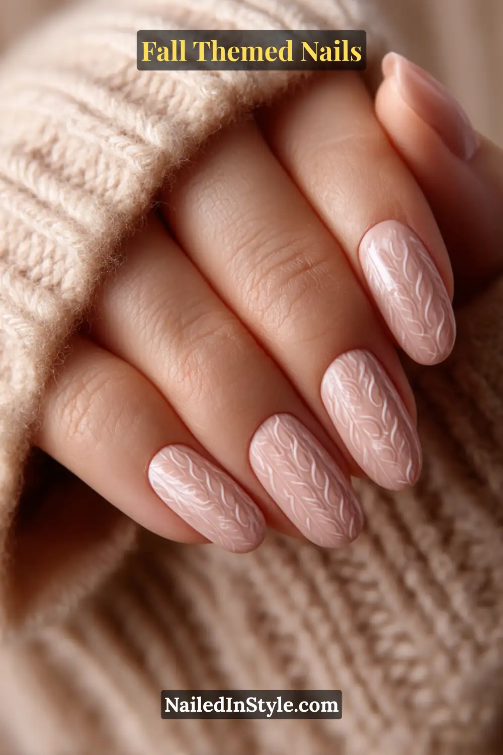 Long fall nails with pale chai base and latte knit-pattern stamping, cozy sweater texture design.